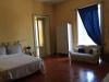 Letto Matrimoniale app.Attico Patti B&B-divano  