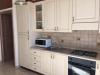 Cucina attrezzata in appartamento vicino a Catania