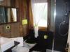 Bagno camera in legno con doccia a S.Vigilio