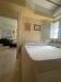 Suite letto king size con TV home-theater Castiglione-del-Lago