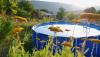 Piscina e parco giochi bambini appartamenti-vacanze Fontecchio