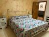 Camera Matrimoniale n1 con letto in ferro battuto