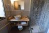 Bagno con kit di cortesia in Appartamento