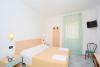 Hotel con Camera in Mezza Pensione 