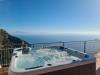 Relax in Vasca Idromassaggio in Appartamento Tramonto