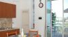 Cucina abitabile con accesso diretto alla terrazza