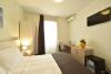 Camera-matrimoniale-arredata-Hotel-vicino-mare-Imperia