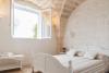 Camera da letto in Suite Superior Masseria Manduria