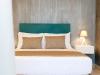 Letto Matrimoniale e Kit Cortesia in Suite