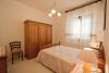 appartamento la Colombaia camera da letto Cortona