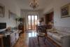 Area soggiorno con cucina B&B a Roma