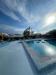 Bellissima piscina esterna a temperatura ambiente 