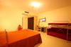 Camera quadrupla dell'albergo a Diamante