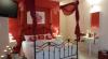 Camera Orchidea con letto a baldacchino
