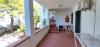 Camere  terrazzino spazio verde esterno Villaggio Rodi-Garganico
