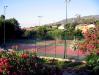 Villaggio con campo da tennis