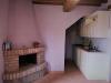 Cucina e camino appartamenti-vacanze vicino Todi