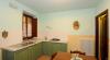 Soggiorno con cucina in legno 